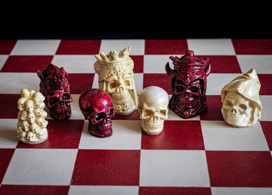 Made to order – Chess set, Skulls design in stone and aged red colour. BOARD NOT INCULDED