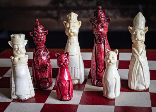 Made to order – Chess set, Royal Cats design in an aged red and stone colour. BOARD NOT INCULDED