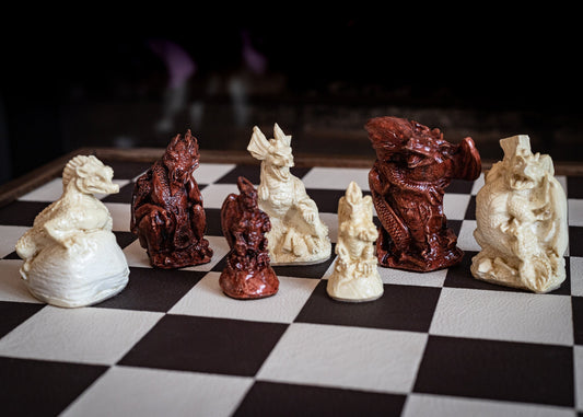 Made To Order – Chess set, Dragons design in an aged terracotta and stone colour. BOARD NOT INCULDED