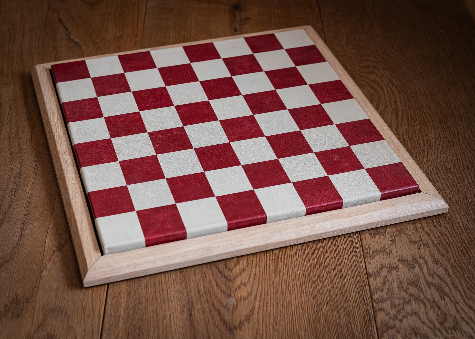 Made to order Chessboard finished in leather, with matching oak trim, 1 1/2"(40mm) squares. BOARD ONLY. Please note these are not in stock.