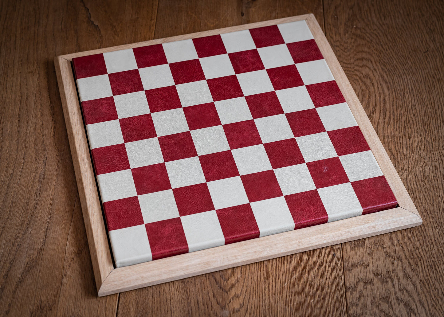 Made to order Chessboard finished in leather, with matching oak trim, 1 1/2"(40mm) squares. BOARD ONLY. Please note these are not in stock.