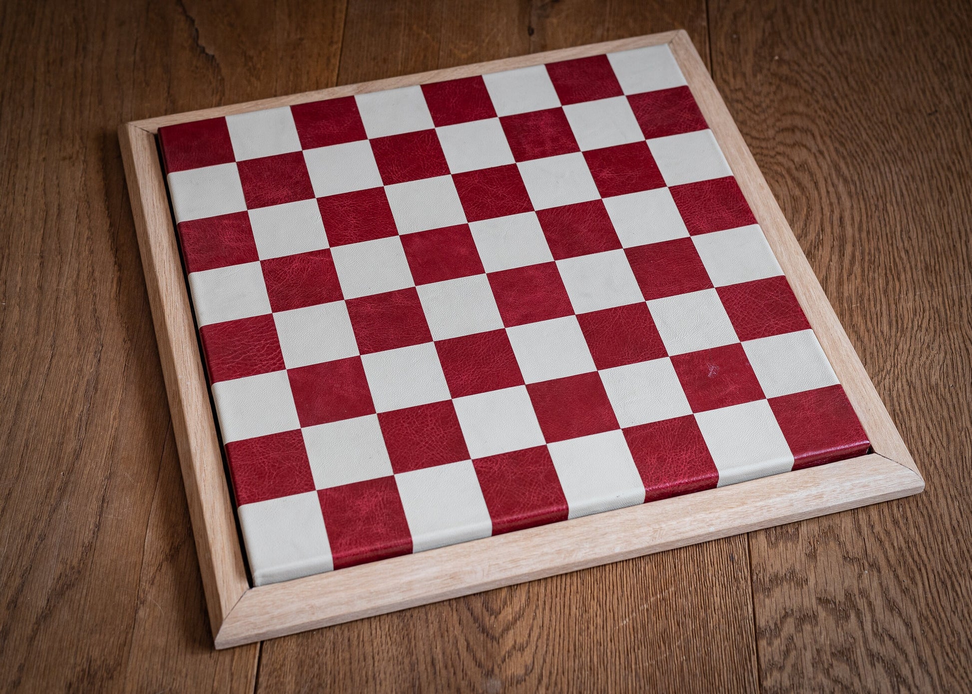 Made to order Chessboard finished in leather, with matching oak trim, 1 1/2"(40mm) squares. BOARD ONLY. Please note these are not in stock.