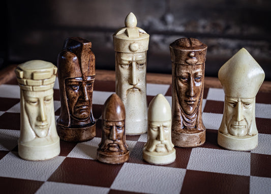 Made to order – Chess set, Gothic heads design, similar to one used in orginal Star Trek series. In aged cream & walnut. BOARD NOT INCULDED