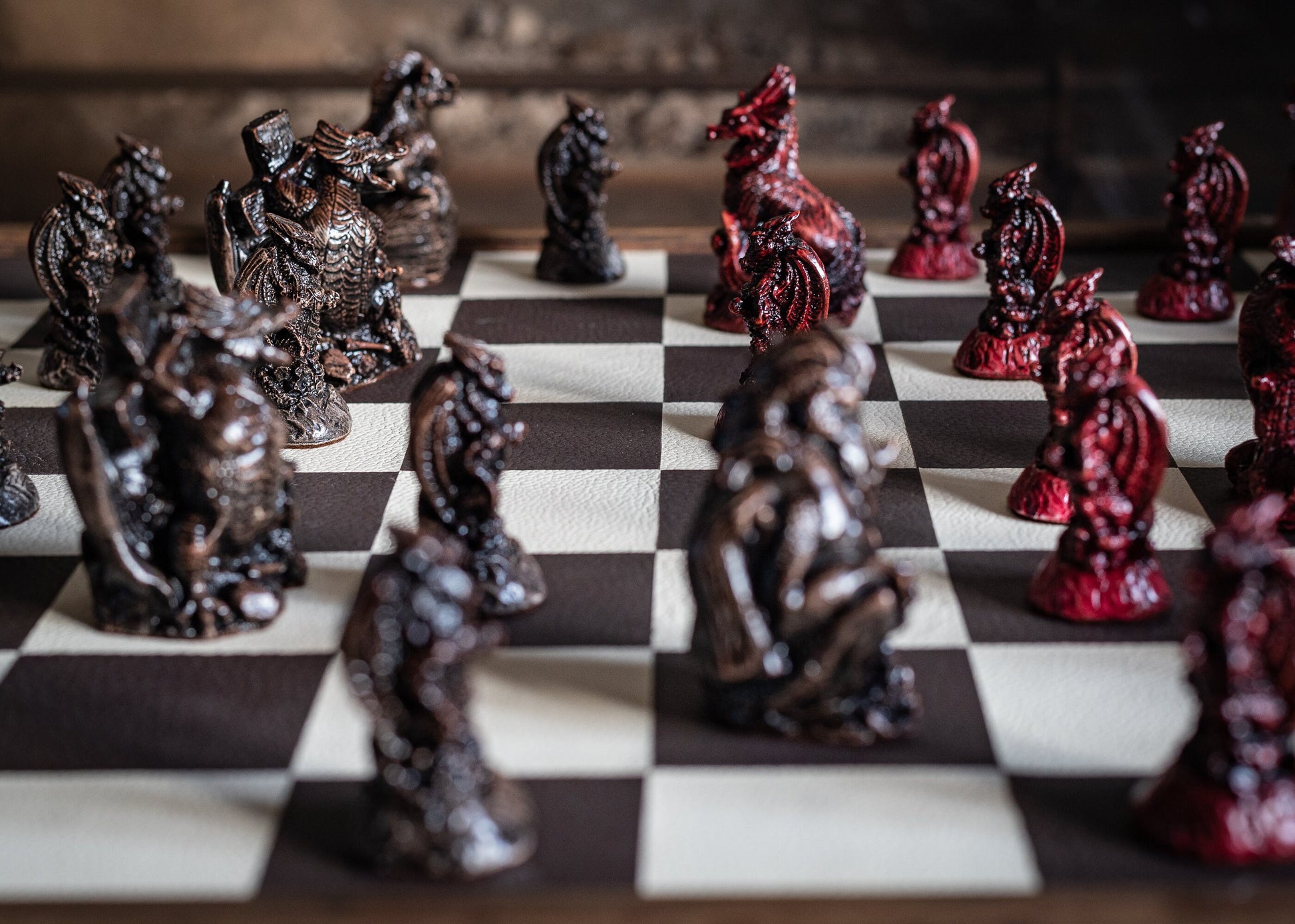 Made To Order – Chess set, Dragons design in ebony and aged red colour. BOARD NOT INCULDED