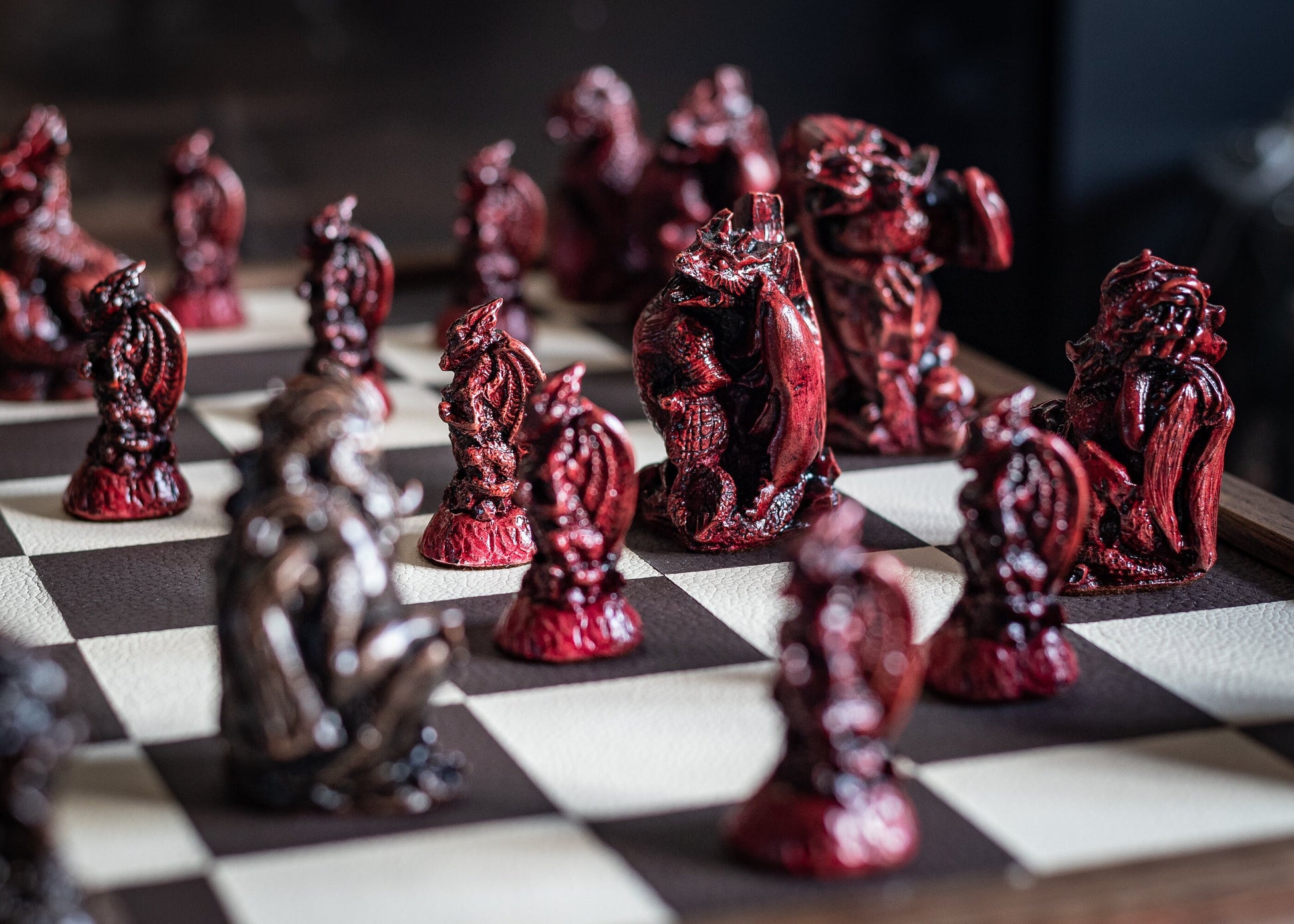 Made To Order – Chess set, Dragons design in ebony and aged red colour. BOARD NOT INCULDED