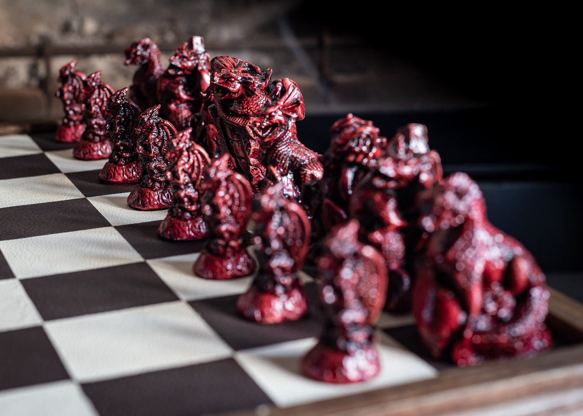 Made To Order – Chess set, Dragons design in ebony and aged red colour. BOARD NOT INCULDED