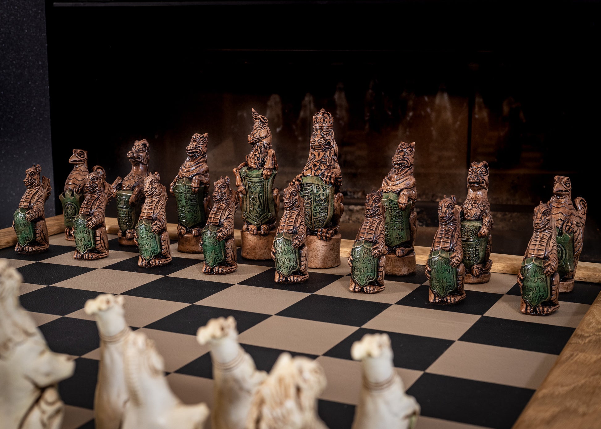 Chess set, Queen's or Royal Beasts, for Queen Elizabeth ii, in an aged ivory and dark oak colour. BOARD NOT INCULDED