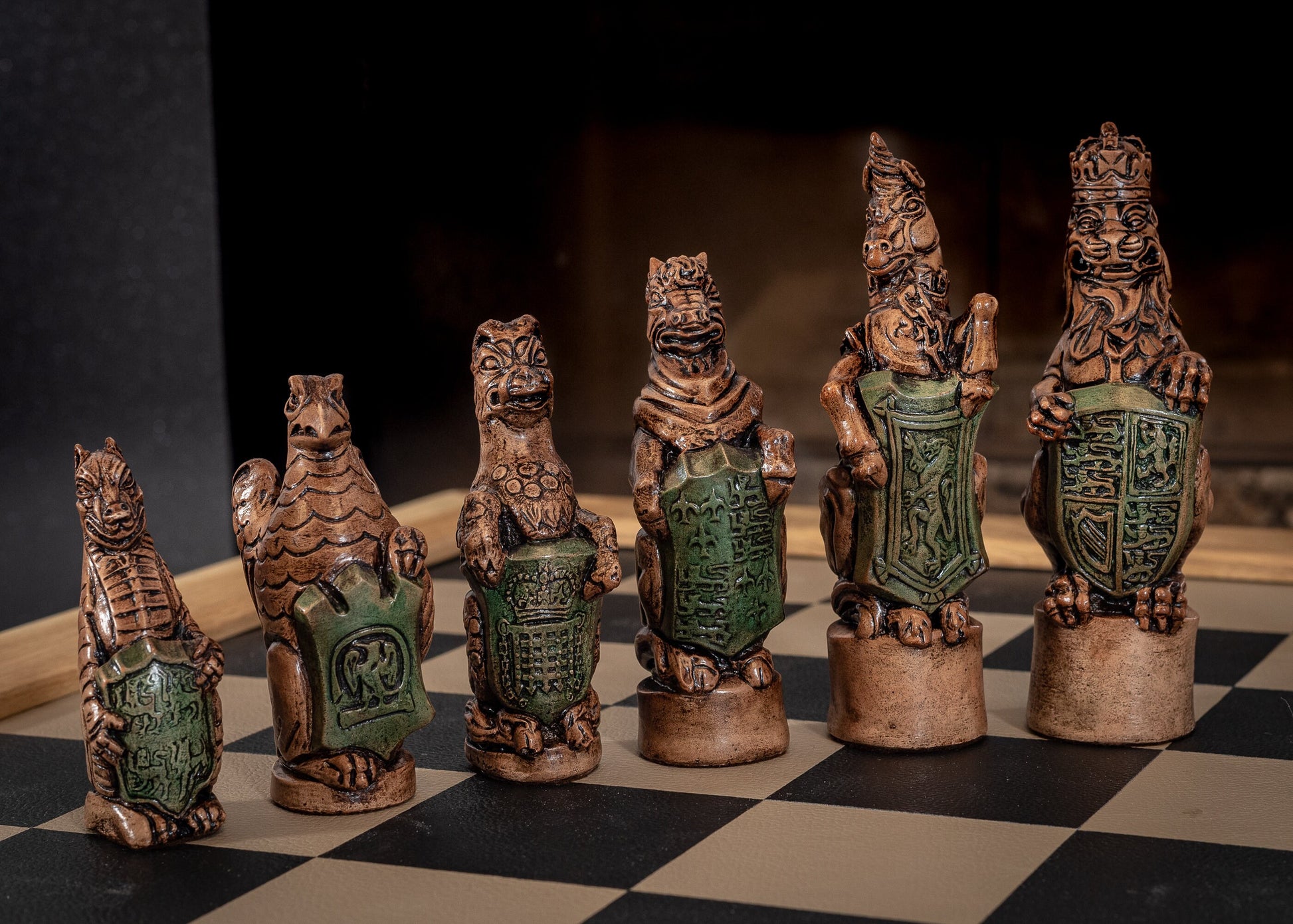 Chess set, Queen's or Royal Beasts, for Queen Elizabeth ii, in an aged ivory and dark oak colour. BOARD NOT INCULDED