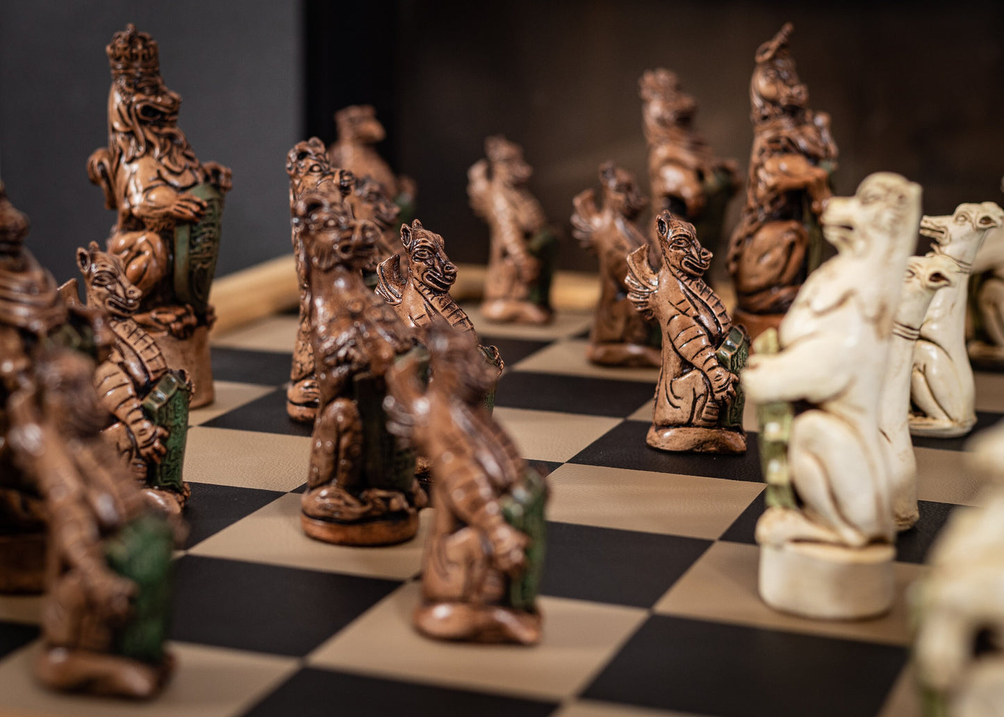 Chess set, Queen's or Royal Beasts, for Queen Elizabeth ii, in an aged ivory and dark oak colour. BOARD NOT INCULDED