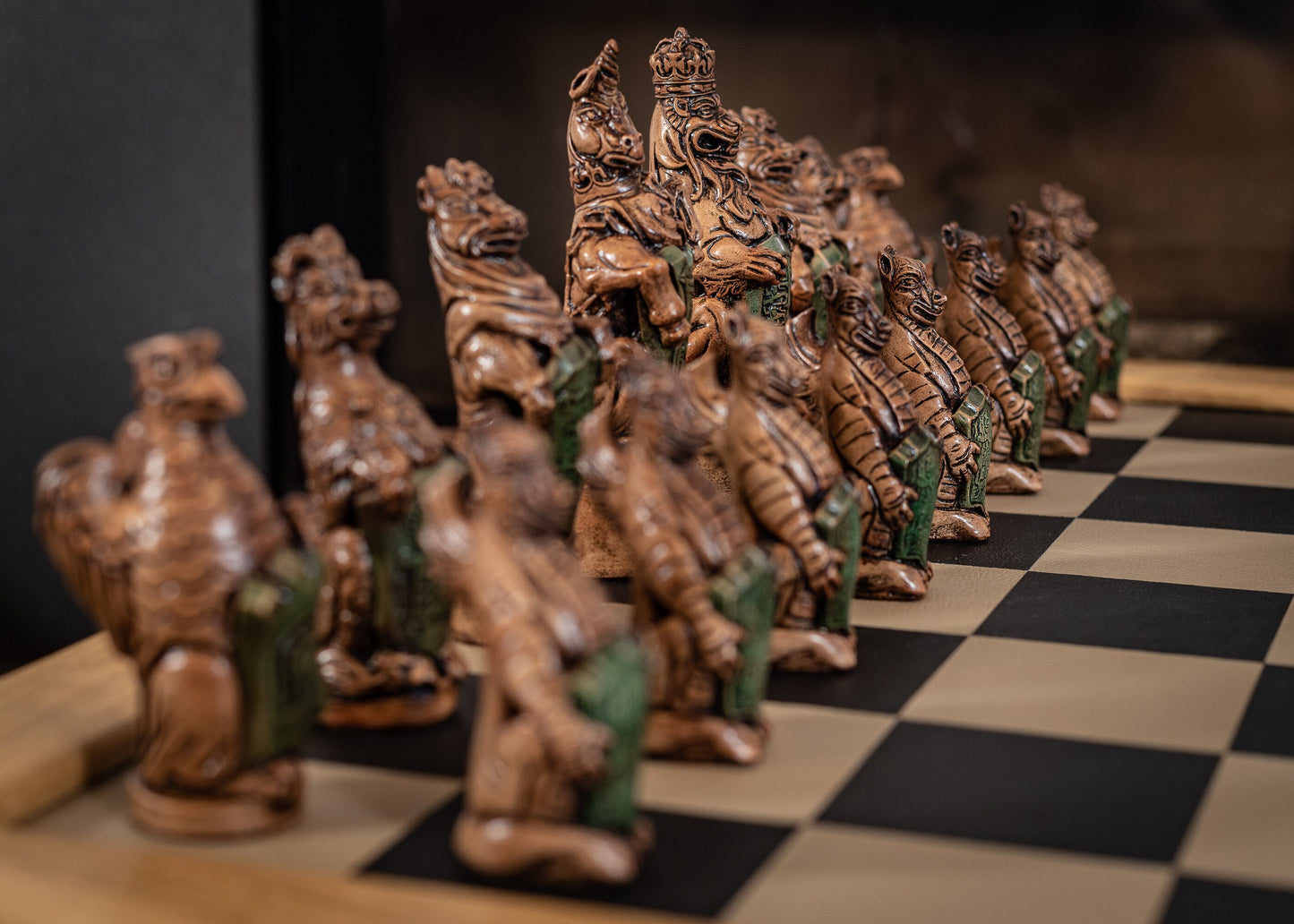 Chess set, Queen's or Royal Beasts, for Queen Elizabeth ii, in an aged ivory and dark oak colour. BOARD NOT INCULDED