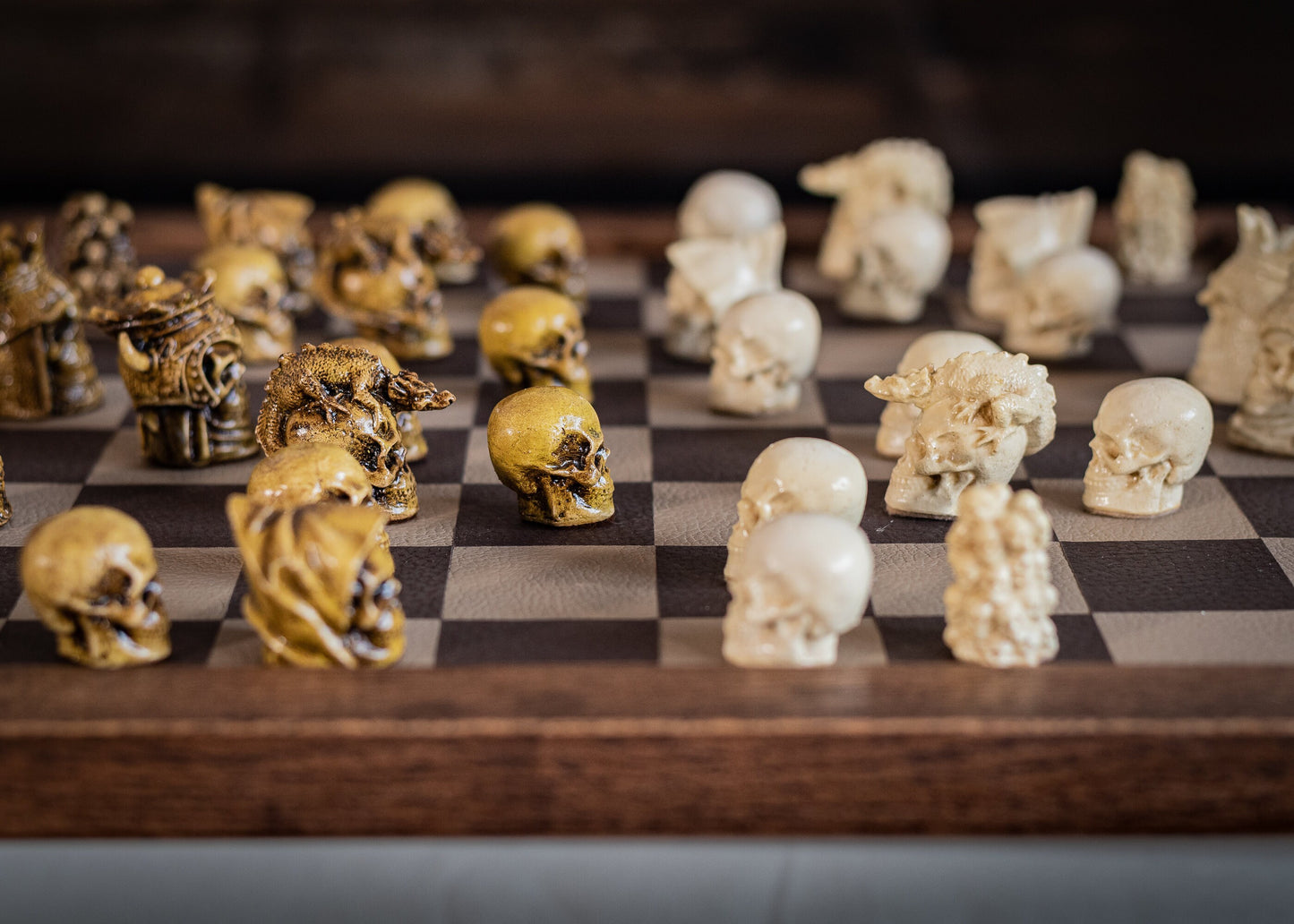 Chess set, Skulls design in aged olive and stone. BOARD NOT INCULDED