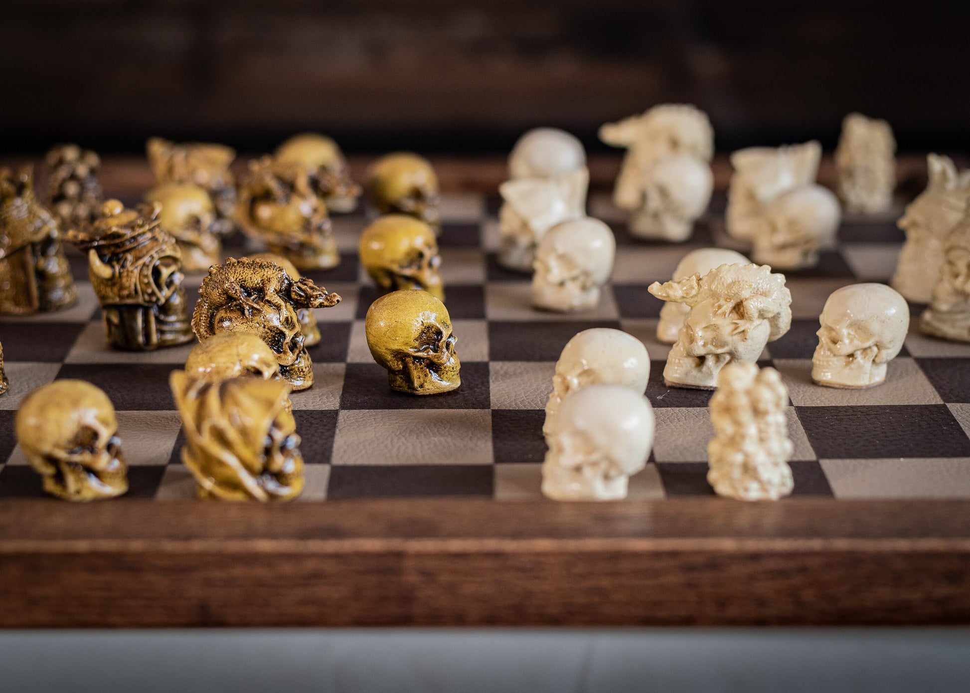 Chess set, Skulls design in aged olive and stone. BOARD NOT INCULDED