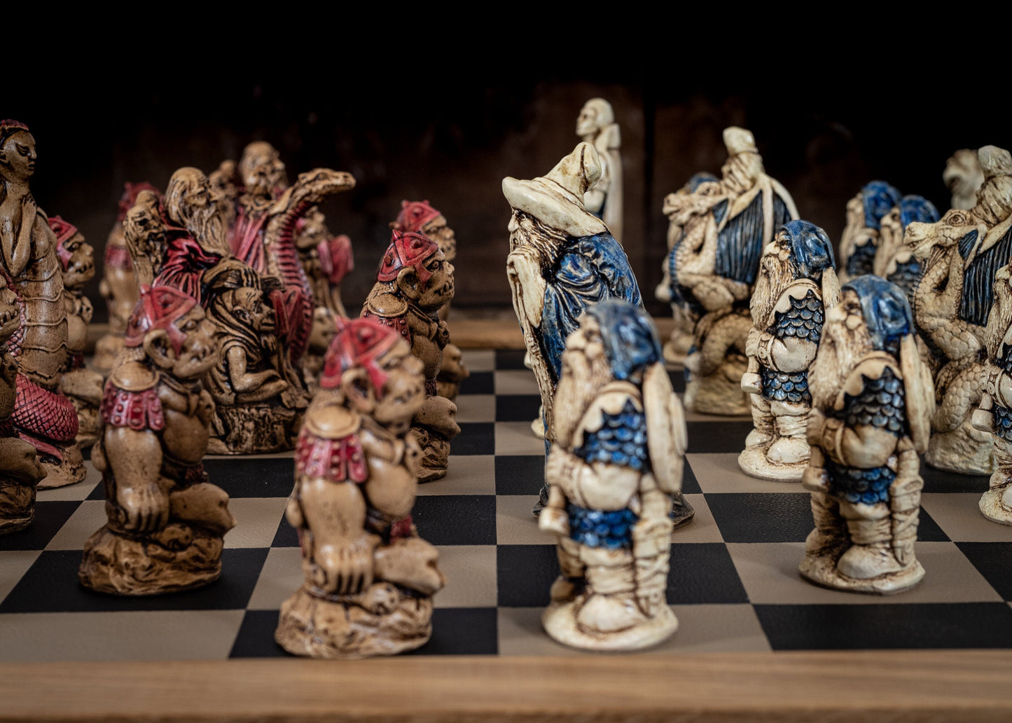 Made to order – Chess set, Spellmaster vs Cobra Queen, in aged ivory, with blue accents and walnut, with red accents. BOARD NOT INCULDED