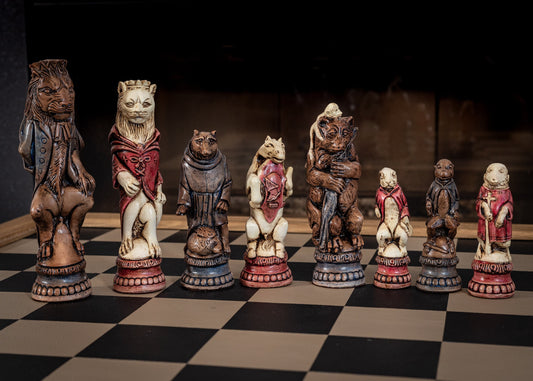 Chess set, Reynard the Fox design in aged ivory, with red accents and dark oak colour, with blue accents. BOARD NOT INCULDED