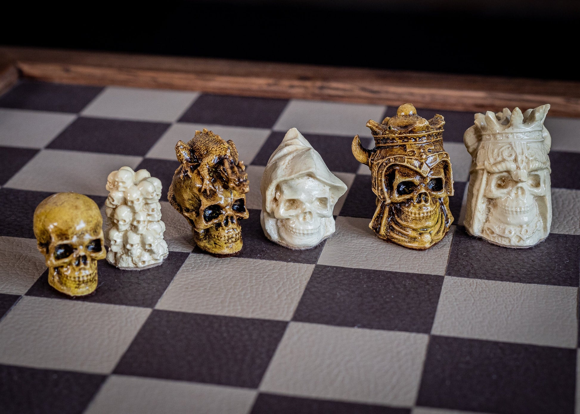 Chess set, Skulls design in aged olive and stone. BOARD NOT INCULDED