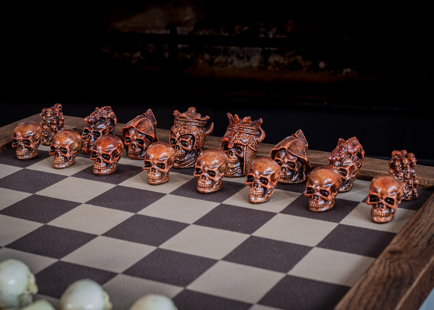 Made to order – Chess set, Skulls design in aged mahogany and stone. BOARD NOT INCULDED