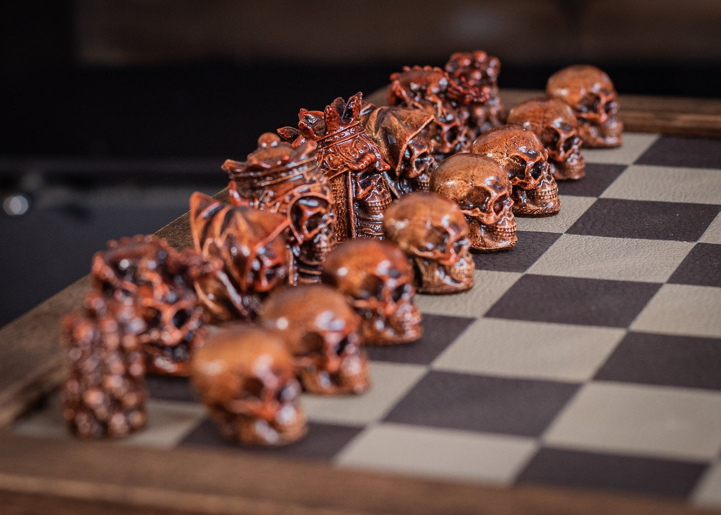 Made to order – Chess set, Skulls design in aged mahogany and stone. BOARD NOT INCULDED