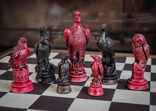 Chess set, British birds, similar to the set in Blade Runner and Stranger Things season 4, in aged red and ebony. BOARD NOT INCULDED