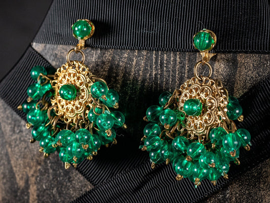 Vintage clip on earrings with ornate gilt centre and green glass like beads