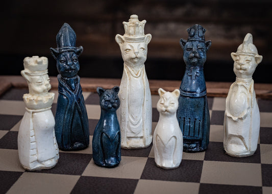 Made to order – Chess set, Royal Cats design in a stone and aged blue colour. BOARD NOT INCULDED