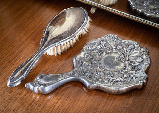 Vintage ladies vanity/dressing table set, silver plated, with brush and mirror. Has a fantastic patina look.