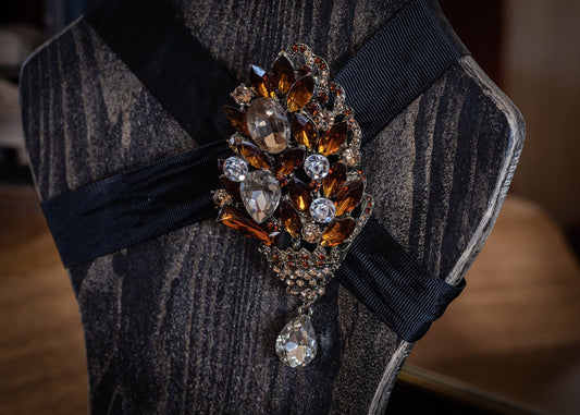 Large vintage crystal and glass brooch, clear crystal and amber glass.