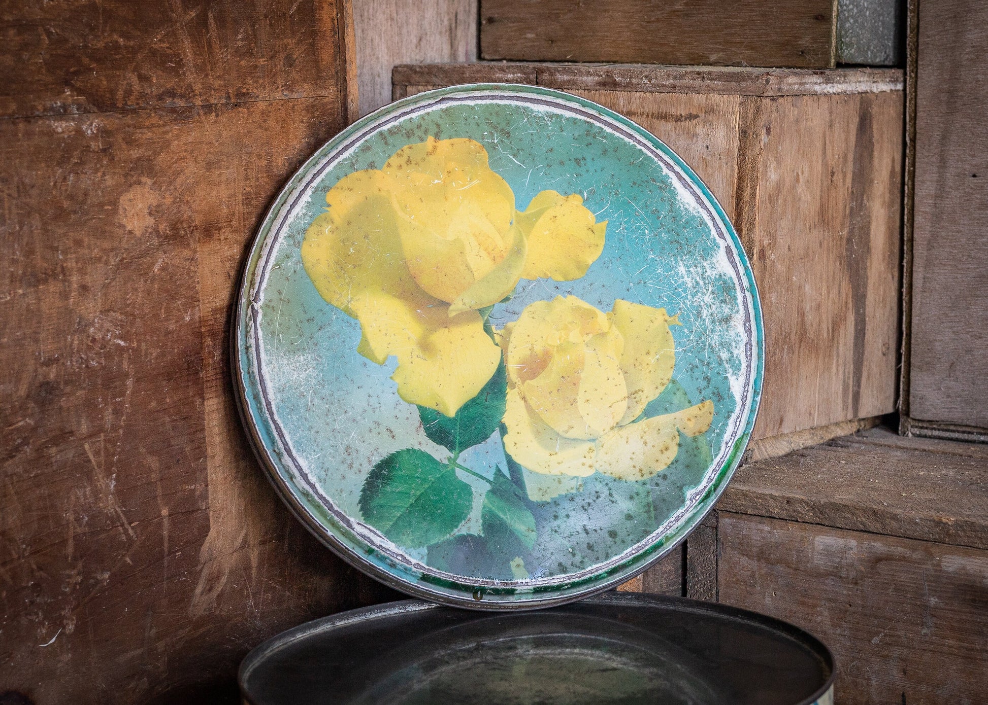 Vintage round confectionery or biscuit tin, with yellow rose design, antique, collectable and rare tins.