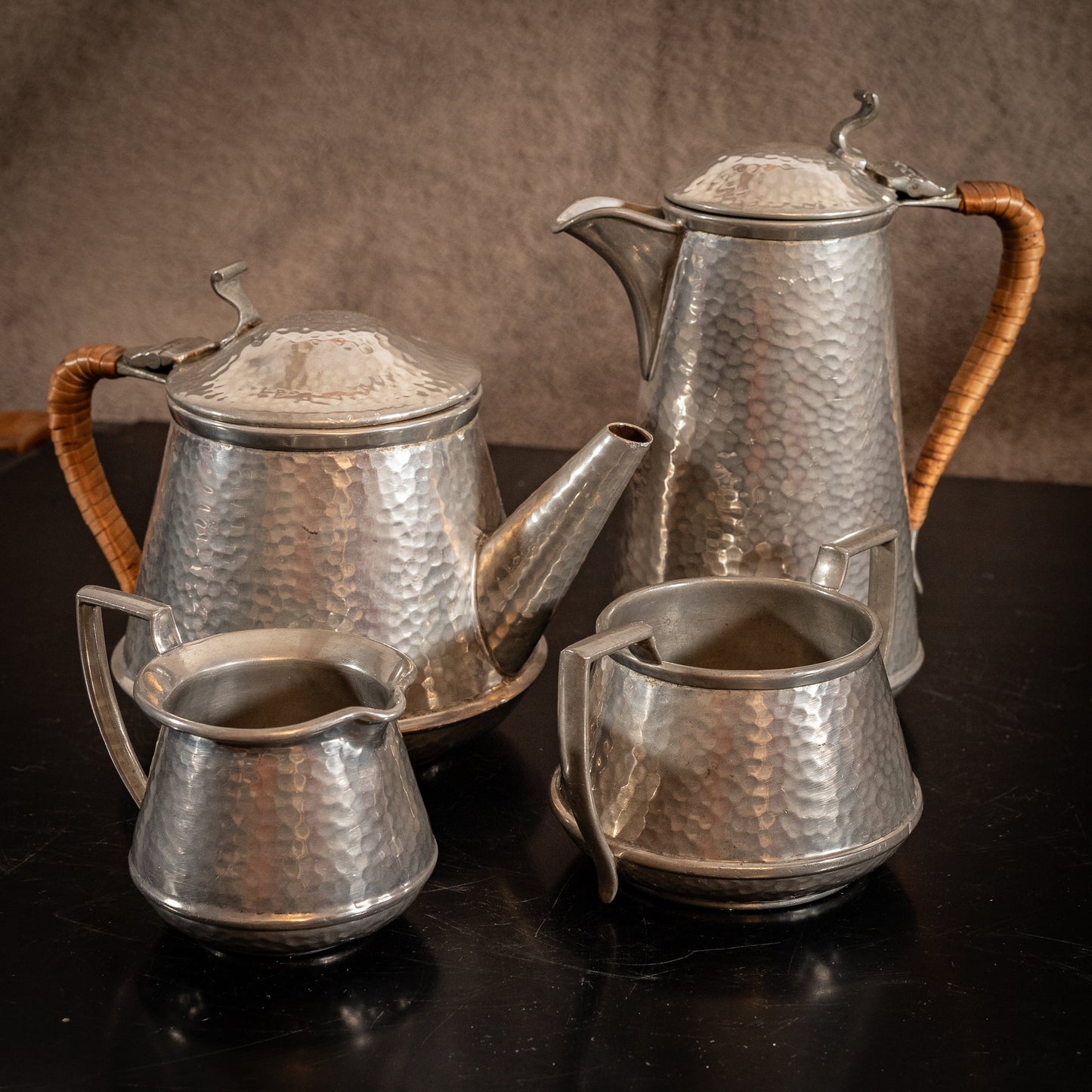 Stunning vintage Craftsman Pewter, 4 piece coffee set, coffee pot, hot water pot, cream jug and sugar bowl, with Ratten handles, circa 1930s