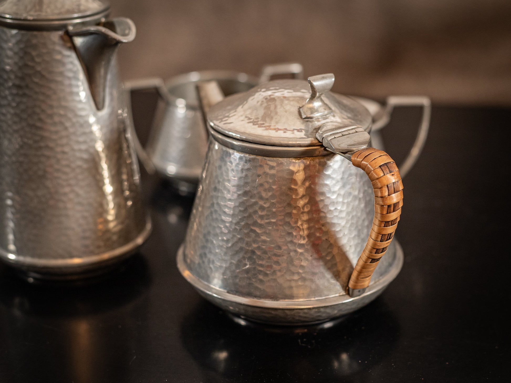 Stunning vintage Craftsman Pewter, 4 piece coffee set, coffee pot, hot water pot, cream jug and sugar bowl, with Ratten handles, circa 1930s