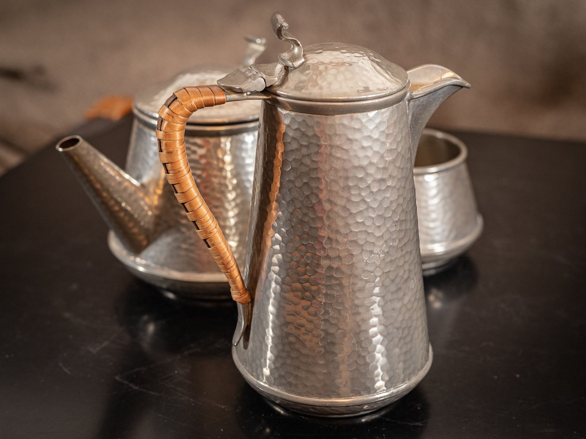 Stunning vintage Craftsman Pewter, 4 piece coffee set, coffee pot, hot water pot, cream jug and sugar bowl, with Ratten handles, circa 1930s