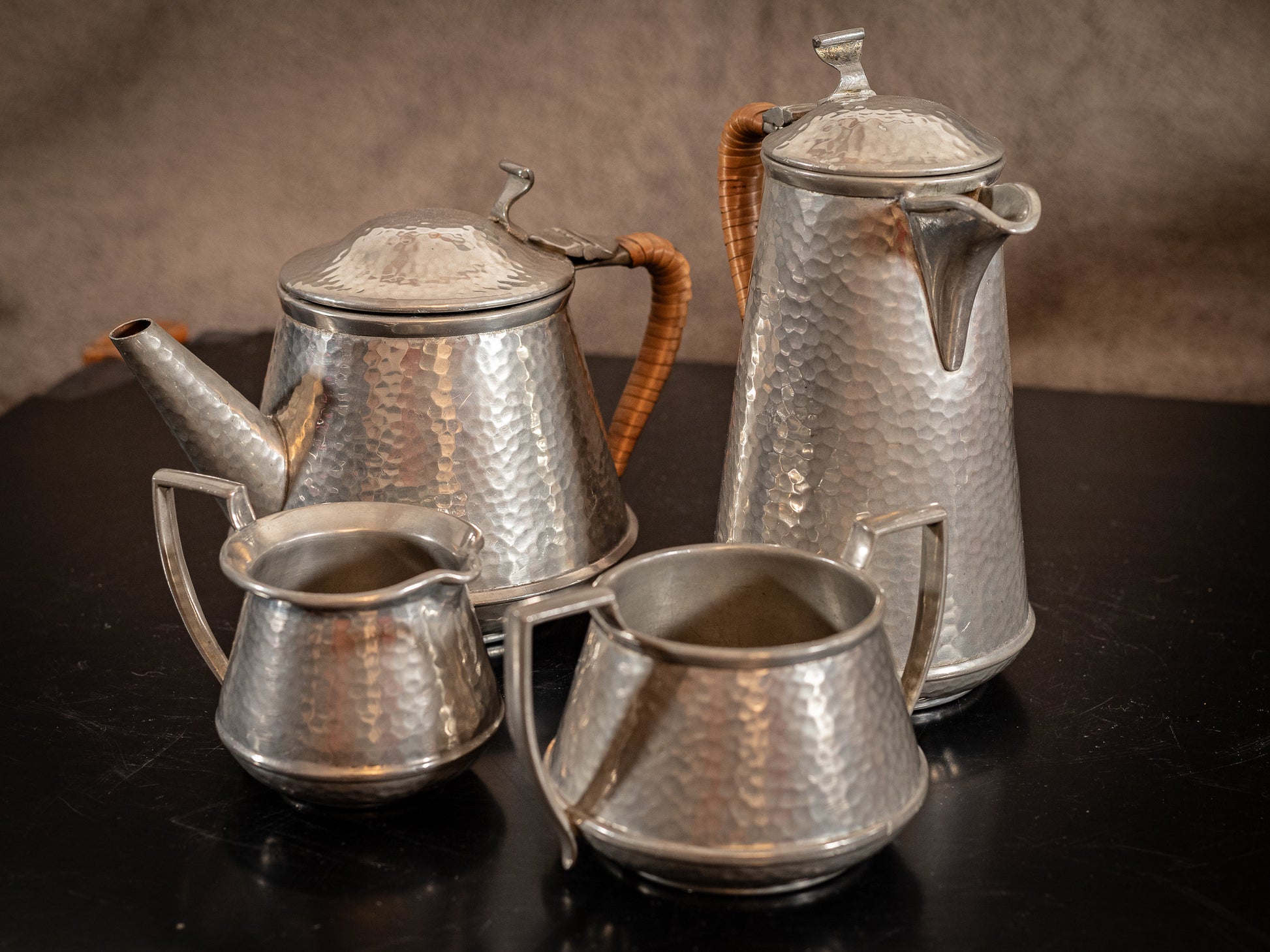 Stunning vintage Craftsman Pewter, 4 piece coffee set, coffee pot, hot water pot, cream jug and sugar bowl, with Ratten handles, circa 1930s